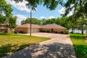 Nestled on the west side of Lake Kiowa, this exceptional for sale in Lake Kiowa Texas Cooke County County on GolfHomes.com