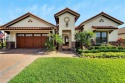 Welcome to Your Dream Waterfront  Golf Estate in Grasslands! for sale in Lakeland Florida Polk County County on GolfHomes.com