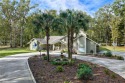 Welcome to 25 Martingale E. This stately property sits behind for sale in Bluffton South Carolina Beaufort County County on GolfHomes.com