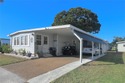 This charming home is truly in wonderful condition and has been for sale in Largo Florida Pinellas County County on GolfHomes.com