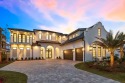 Pristine architectural design paired with sweeping golf course for sale in Santa Rosa Beach Florida Walton County County on GolfHomes.com