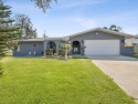 Welcome to this charming 3-bedroom, 2-bathroom home with a 2-car for sale in Largo Florida Pinellas County County on GolfHomes.com