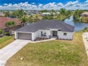 Welcome to your dream waterfront lifestyle in Cape Coral! This for sale in Cape Coral Florida Lee County County on GolfHomes.com