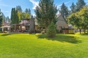 On the course (15th tee-box) at the historic Hayden Lake Country for sale in Hayden Lake Idaho Kootenai County County on GolfHomes.com