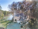 Completely renovated lake front turn-key luxury home in Turtle for sale in Monticello Georgia Jasper County County on GolfHomes.com