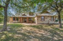 Custom-built Home on apprx 3 acres in gated White Bluff Resort for sale in Whitney Texas Hill County County on GolfHomes.com