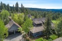 Located on the first fairway of Gozzer Ranch Golf an dLake Club for sale in Harrison Idaho Kootenai County County on GolfHomes.com