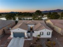 Discover the crown jewel of the award-winning Mountain Falls for sale in Pahrump Nevada Nye County County on GolfHomes.com