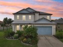 Welcome to this beautifully appointed 4-bedroom, 3.5-bathroom for sale in Wesley Chapel Florida Pasco County County on GolfHomes.com