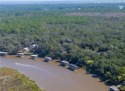 Nestled beneath a majestic canopy of Oaks on over 1.4 acres of for sale in Saint Simons Georgia Glynn County County on GolfHomes.com