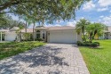 This gorgeous home has it all!  Check out the curb appeal of the for sale in Sun City Center Florida Hillsborough County County on GolfHomes.com