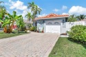 Exquisite Waterfront Residence boasting a tranquil vista from for sale in Plantation Florida Broward County County on GolfHomes.com