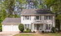 This charming 4-bedroom, 2.5-bathroom home offers both comfort for sale in Newnan Georgia Coweta County County on GolfHomes.com