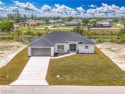 Welcome to your dream waterfront lifestyle in Cape Coral! This for sale in Cape Coral Florida Lee County County on GolfHomes.com