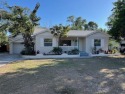 Beautifully updated 4 bedrooms 2 bath on the golf course in for sale in St. Petersburg Florida Pinellas County County on GolfHomes.com