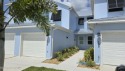 Stunning end-unit Key West Style concrete block condo in Bella for sale in Rockledge Florida Brevard County County on GolfHomes.com
