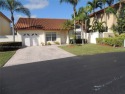Discover your dream home in the desirable Doral Glen community for sale in Doral Florida Miami-Dade County County on GolfHomes.com