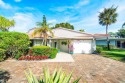 Welcome to this beautifully renovated 3-bedroom, 2-bathroom home for sale in Palm Beach Gardens Florida Palm Beach County County on GolfHomes.com