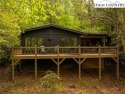 Perfectly situated for optimum privacy on a double lot with a for sale in Newland North Carolina Avery County County on GolfHomes.com