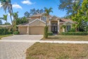 Situated on a quiet street in the heart of Belleair, this for sale in Belleair Beach Florida Pinellas County County on GolfHomes.com