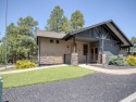 Welcome to your dream mountain retreat! This fully furnished for sale in Show Low Arizona Navajo County County on GolfHomes.com
