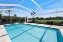 Enjoy expansive golf course views as you float in your pool or for sale in Naples Florida Collier County County on GolfHomes.com