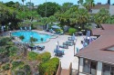 Charming pristine condo with 2 master suites and parking right for sale in Naples Florida Collier County County on GolfHomes.com