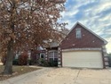 Spacious 5-bedroom, 3.5-bath, 2-story brick home on a large for sale in Owasso Oklahoma Tulsa County County on GolfHomes.com
