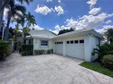 This charming  meticulously maintained home sits on a lush for sale in Pembroke Pines Florida Broward County County on GolfHomes.com