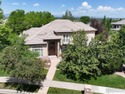 Discover luxury living in this stunning two-story home with main for sale in Westminster Colorado Adams County County on GolfHomes.com