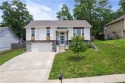 Welcome Home! This stunning contemporary home sits just outside for sale in Belton Missouri Cass County County on GolfHomes.com