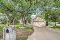A beautiful 3 bedroom, 2.5 bath on a corner lot covered in for sale in Granbury Texas Hood County County on GolfHomes.com