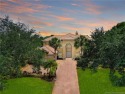 PRIVATE LAKESIDE RETREAT - This updated 5 BR, 6 bath, 4 garage for sale in Palm City Florida Martin County County on GolfHomes.com