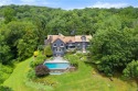 Welcome to Brookside!  Gates open to a long, private drive to for sale in Waccabuc New York Westchester County County on GolfHomes.com