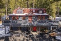 Tahoe Donner Cabin with Views! Tucked away in the trees on a for sale in Truckee California Nevada County County on GolfHomes.com