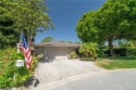Welcome to your private oasis in Country Club Estates! Tucked for sale in Port Saint Lucie Florida Saint Lucie County County on GolfHomes.com