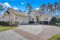 Greeted off a quiet cul-de-sac street, this stately home proudly for sale in Bluffton South Carolina Beaufort County County on GolfHomes.com