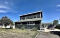 Incredible potential - 4 bed - 2.5 bath home on TWO LOTS within for sale in Ennis Montana Madison County County on GolfHomes.com