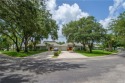 This 2/2 plus den with a 1 car garage is set on a peaceful lake for sale in Palm City Florida Martin County County on GolfHomes.com