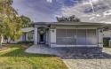 This immaculate two-bedroom, two-bathroom home with a two-car for sale in Spring Hill Florida Hernando County County on GolfHomes.com