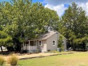 This super cute cottage style home sits on a double corner lot for sale in East Tawakoni Texas Hunt County County on GolfHomes.com