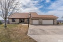 Located on a sprawling 2.3-acre lot, this 4-bedroom, 3-full for sale in De Witt Iowa Clinton County County on GolfHomes.com