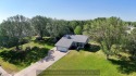 This charming home sits on a large lot with mature trees on the for sale in Grand Island Nebraska Hall County County on GolfHomes.com