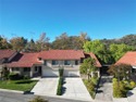 Welcome to this beautifully updated tri-level 3-bedroom for sale in Newhall California Los Angeles County County on GolfHomes.com