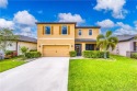 Welcome to this beautifully maintained 4-bedroom, 2.5-bathroom for sale in Port Saint Lucie Florida Saint Lucie County County on GolfHomes.com