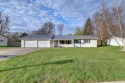 Tee off to easy living perfectly situated on beautiful Country for sale in Armstrong Iowa Emmet County County on GolfHomes.com