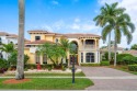 Elegant 4-bedroom, 5.1-bath home nestled on the picturesque for sale in Delray Beach Florida Palm Beach County County on GolfHomes.com