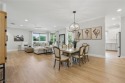 Welcome home to this elegant $100k remodel, first-floor for sale in Bonita Springs Florida Lee County County on GolfHomes.com