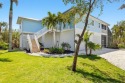 This delightful, turn-Key furnished, *Beach House* is 2 minutes for sale in Sanibel Florida Lee County County on GolfHomes.com