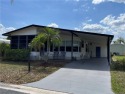 Lovely home with a new A/C in 2021. New washer & dryer and for sale in Indiantown Florida Martin County County on GolfHomes.com